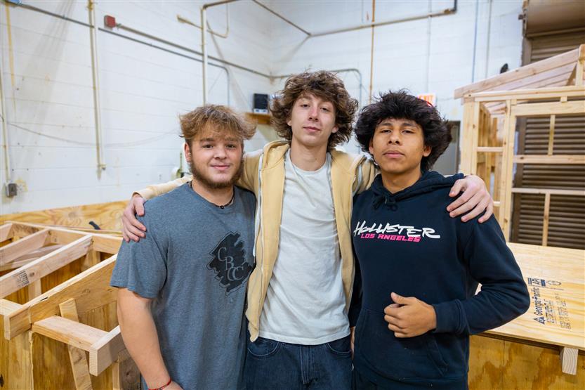 Students build doghouses